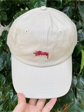 Stussy cream baseball cap with red logo